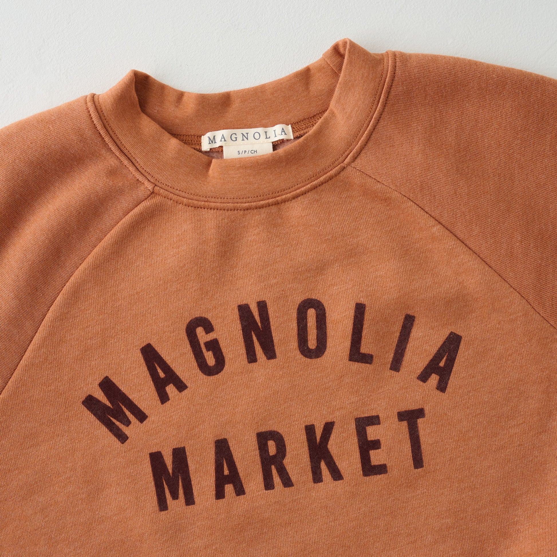 Magnolia Market Terracotta Sweatshirt up close
