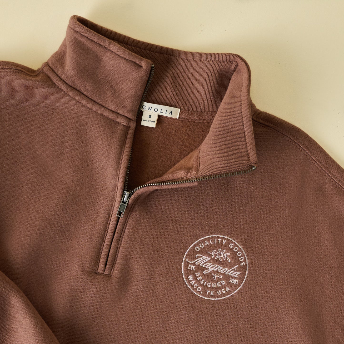 Magnolia Mocha Quarter Zip Sweatshirt close up view