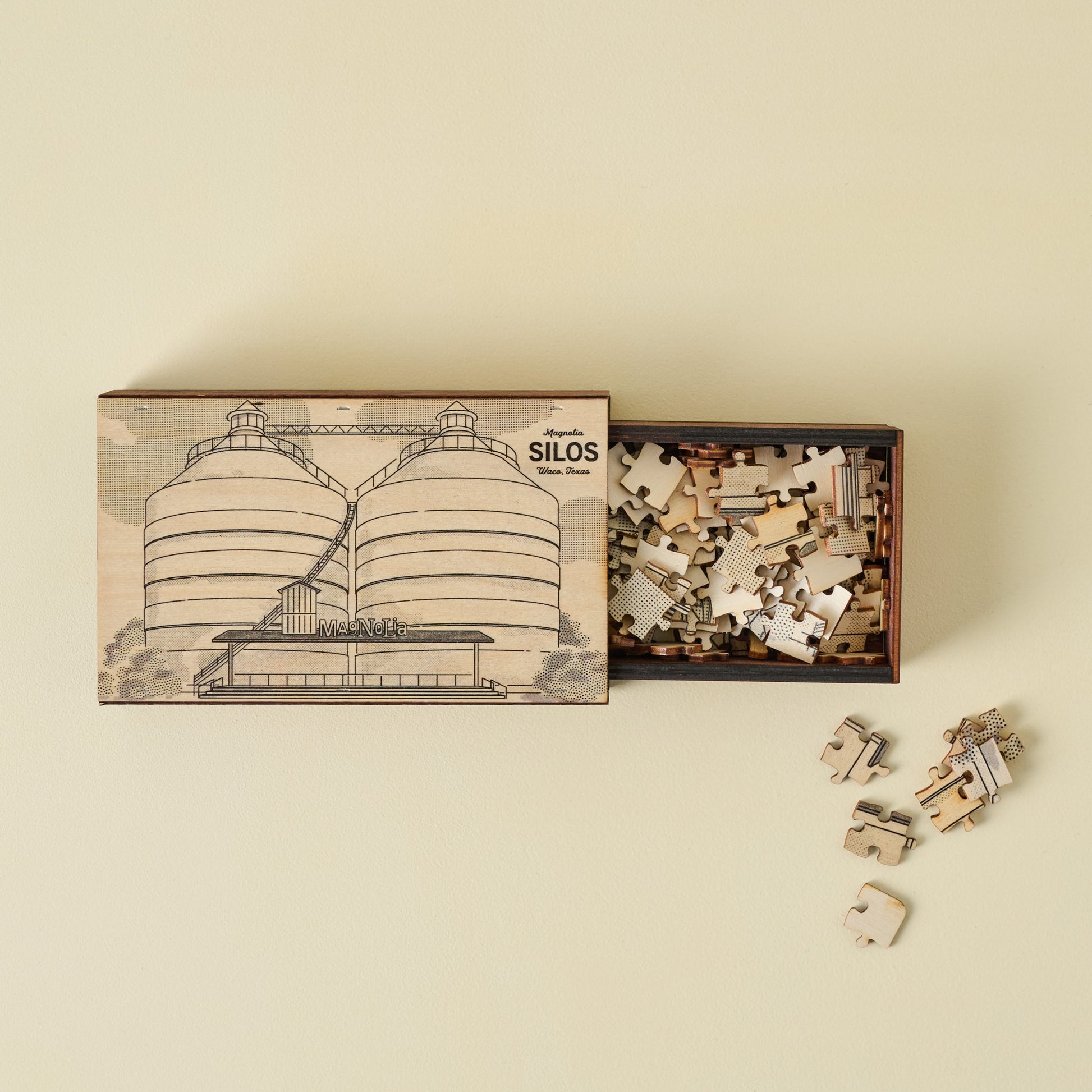 Magnolia Wooden Puzzle with puzzles pulled out