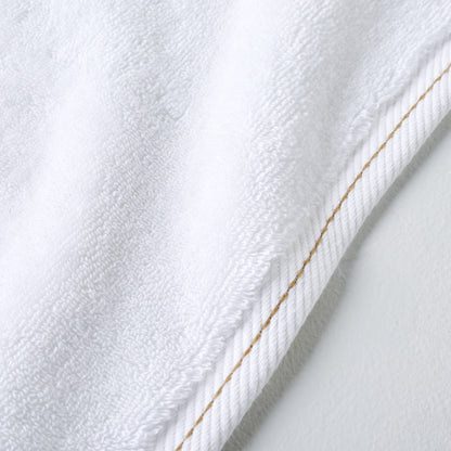 Magnolia White Plush Stitched Edge Towel up close