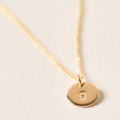 magnolia gold initial disc necklace