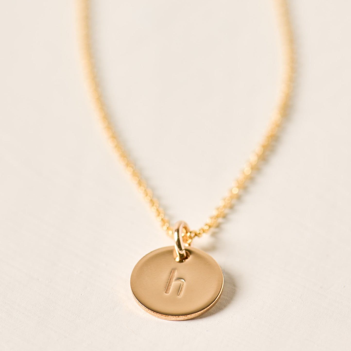 magnolia gold initial disc necklace