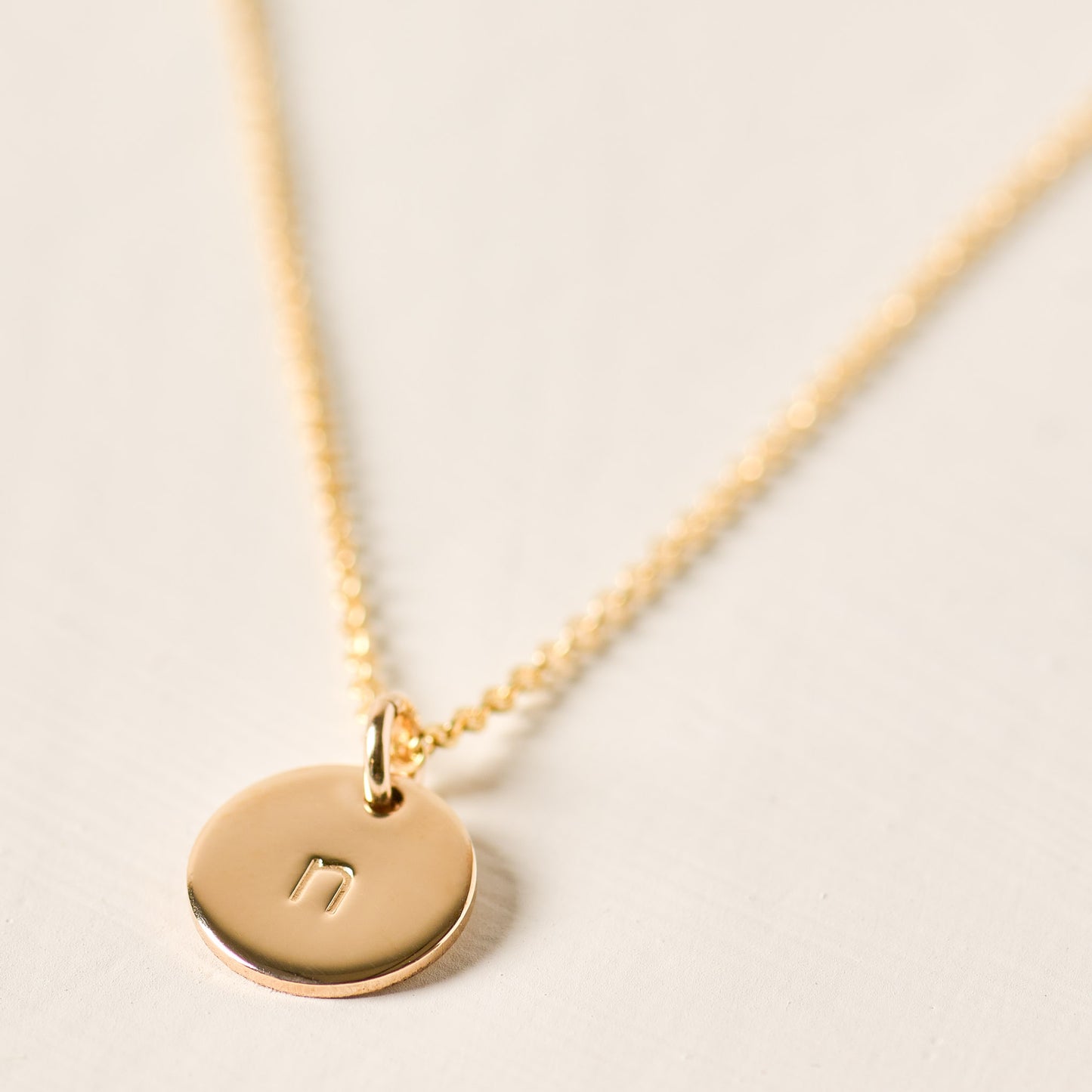 magnolia gold initial disc necklace