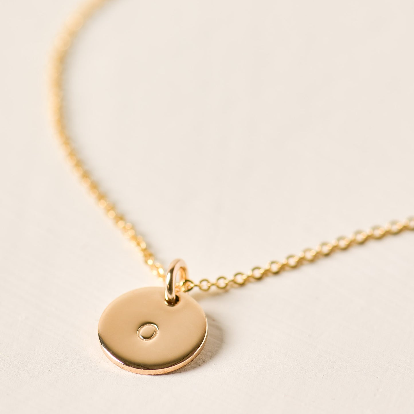 magnolia gold initial disc necklace