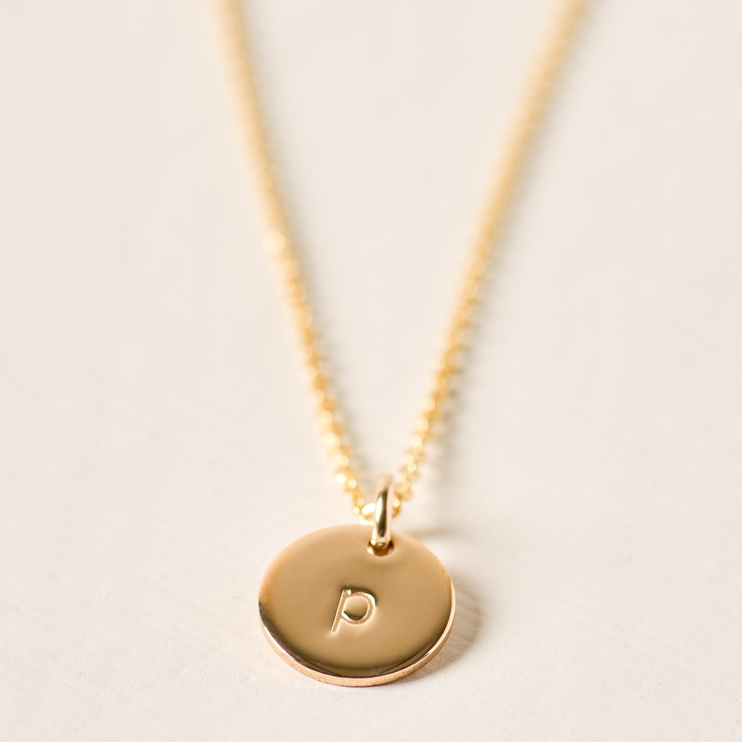 magnolia gold initial disc necklace