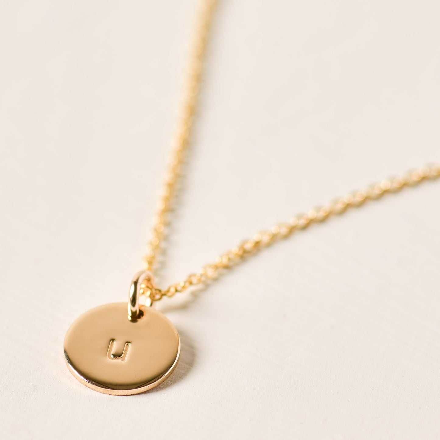 magnolia gold initial disc necklace