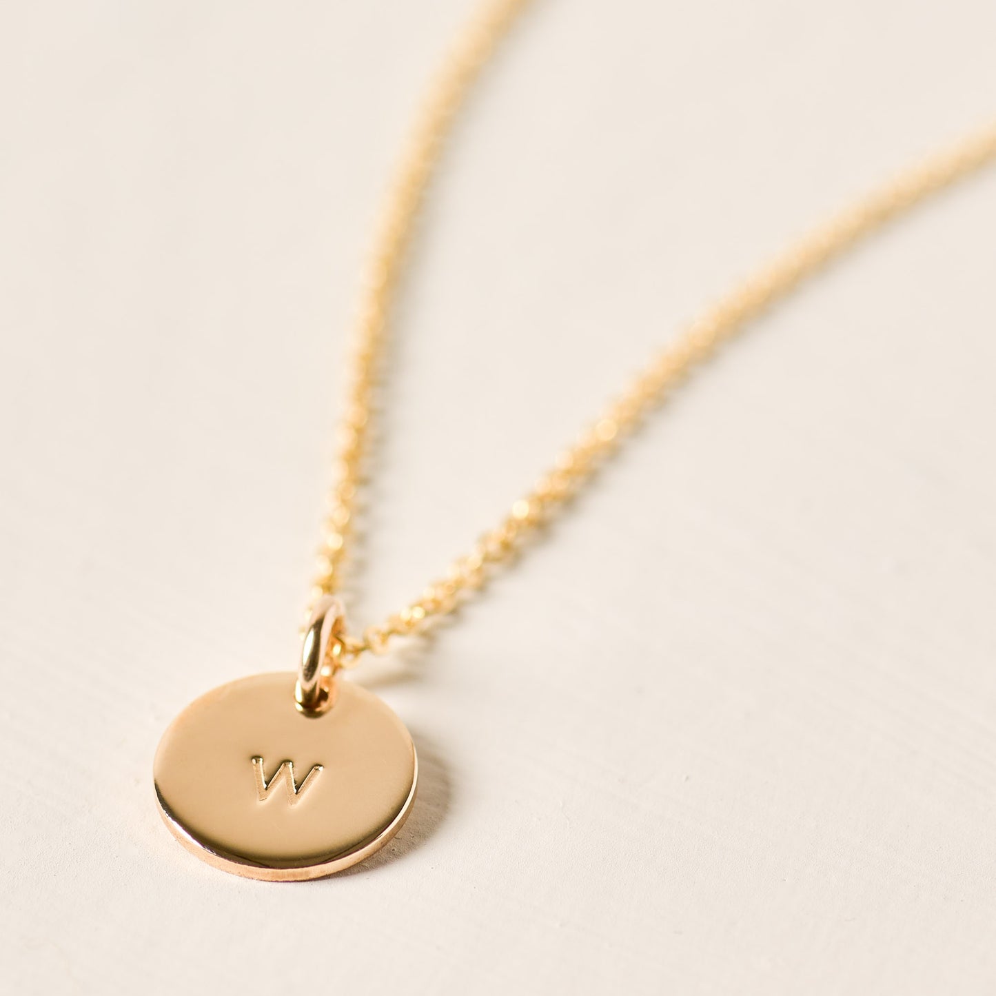 magnolia gold initial disc necklace