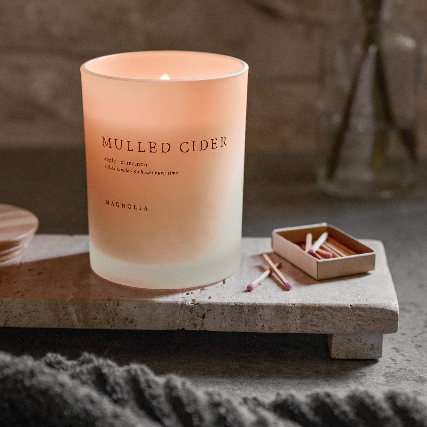 9oz Magnolia Mulled Cider Candle lit