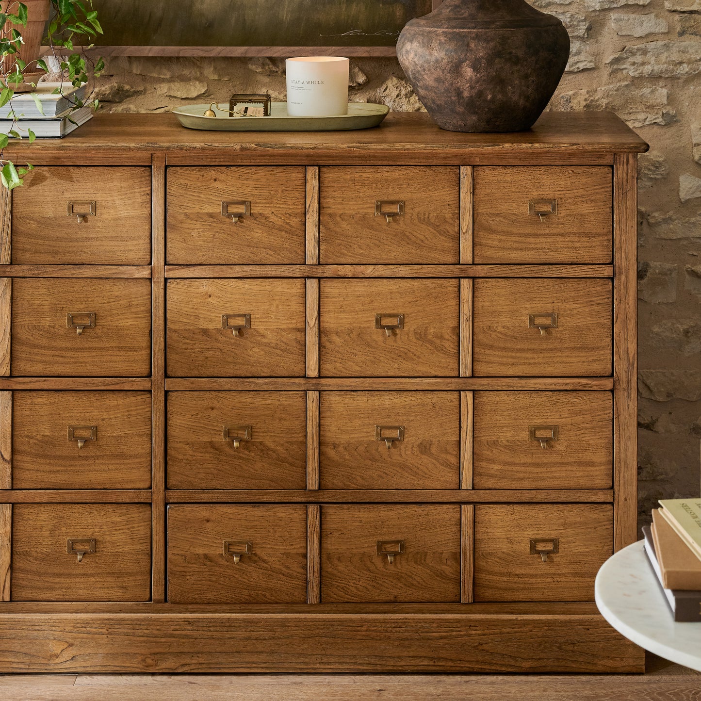 Hancock Cardlog Cabinet in a room with decorative items on top
