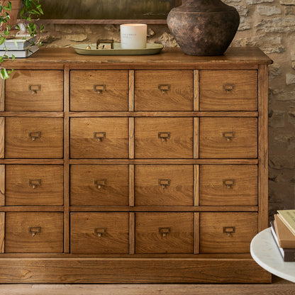 Hancock Cardlog Cabinet in a room with decorative items on top