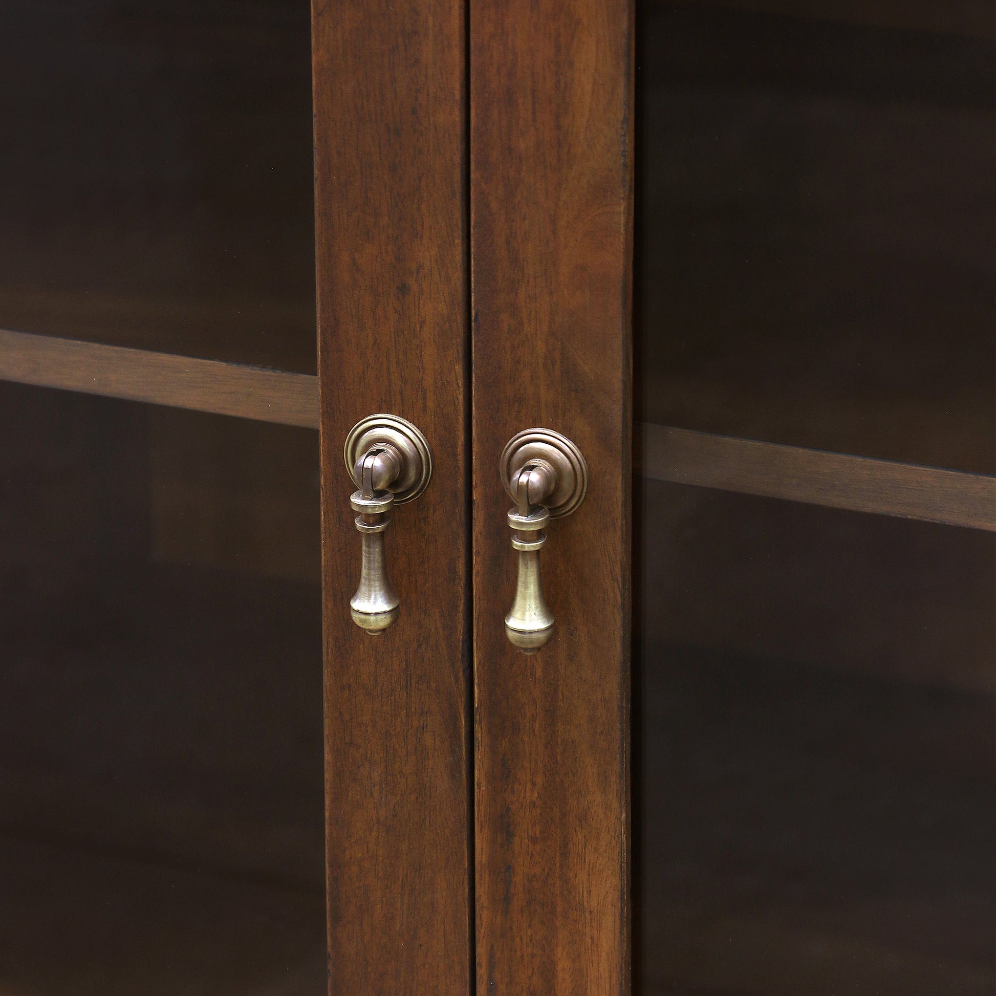 Annette Media Console close up of glass door and metal brass doorknobs