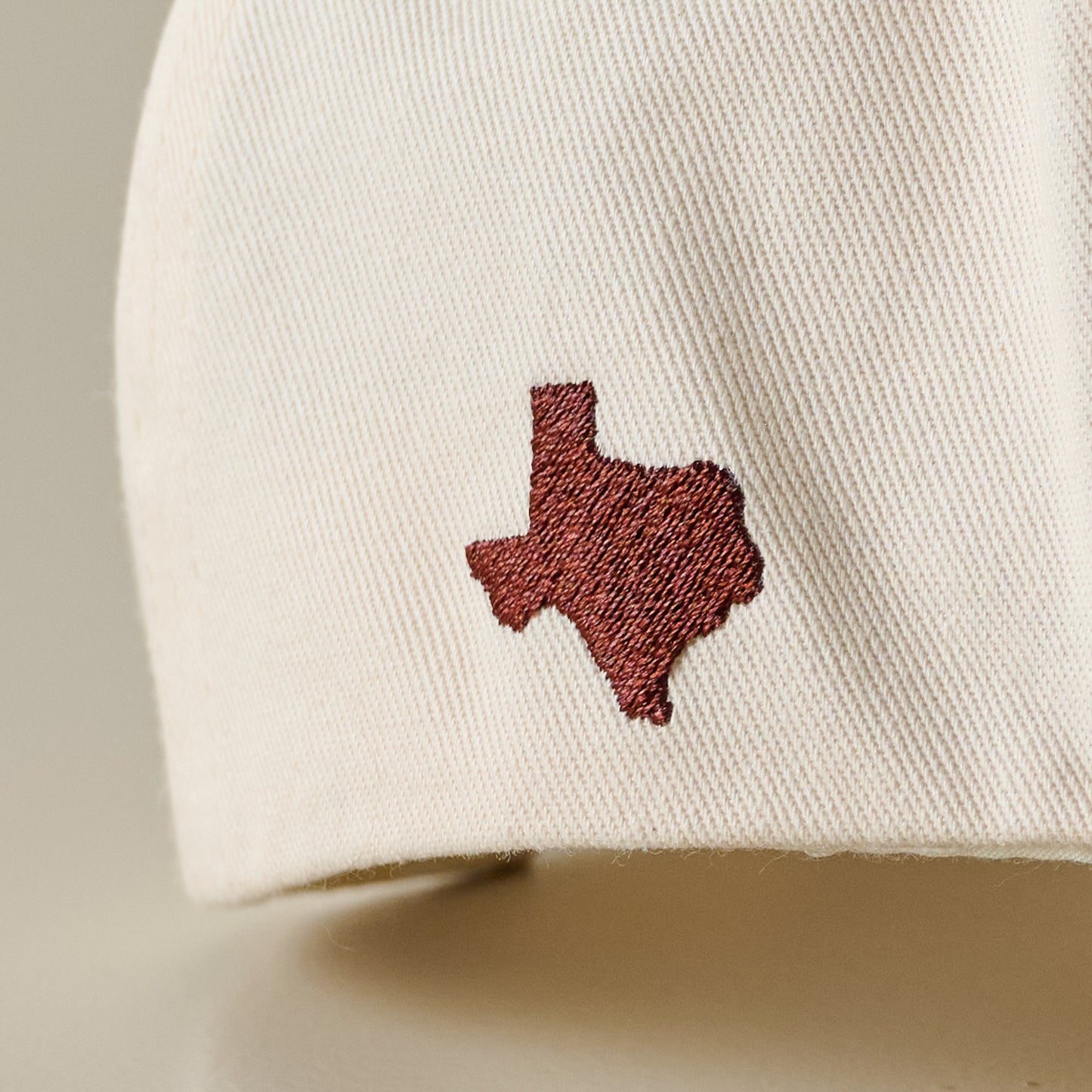 Meet me in Texas Ivory Hat logo