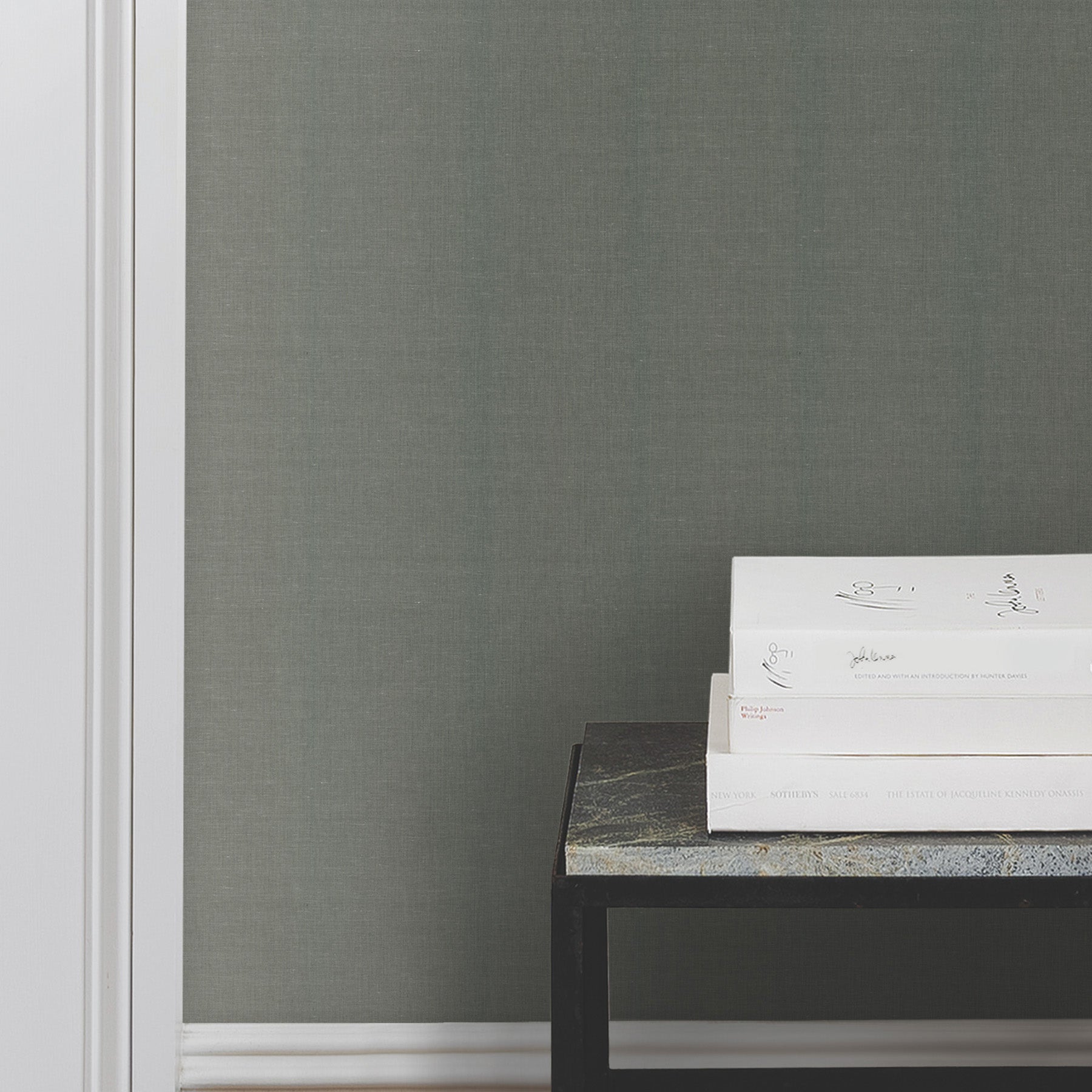 Crosshatch String Wallpaper in Emerald shown on wall