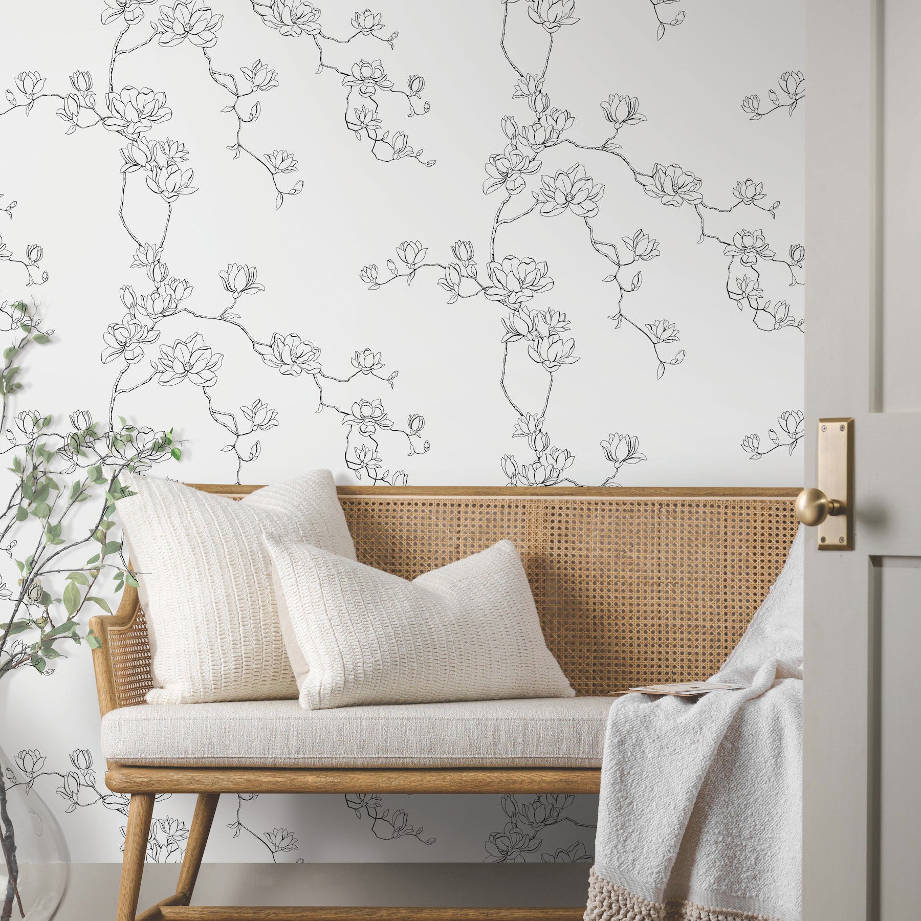 Magnolia Branches Wallpaper in black shown in room