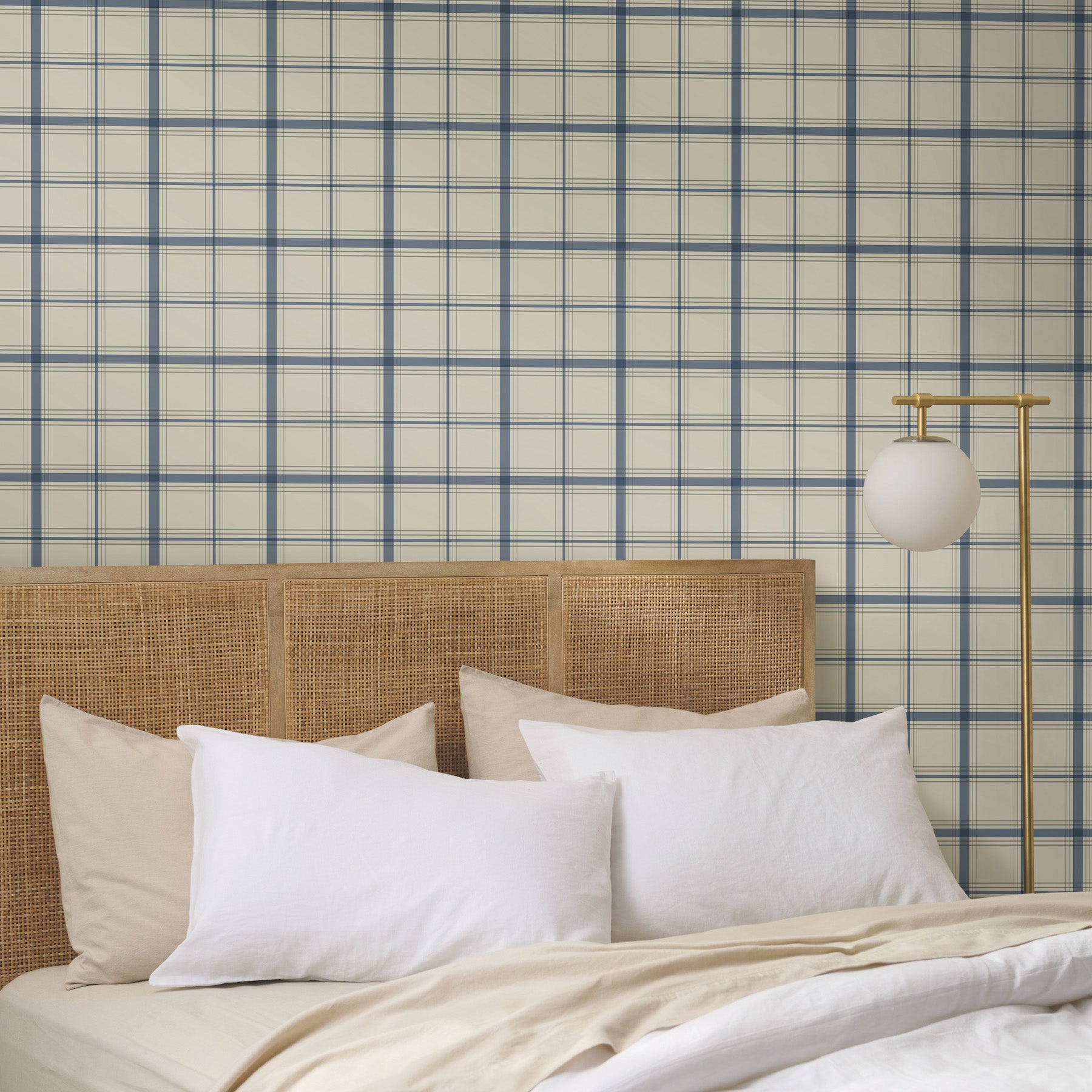 Hunter Wallpaper in blue shown on wall in bedroom