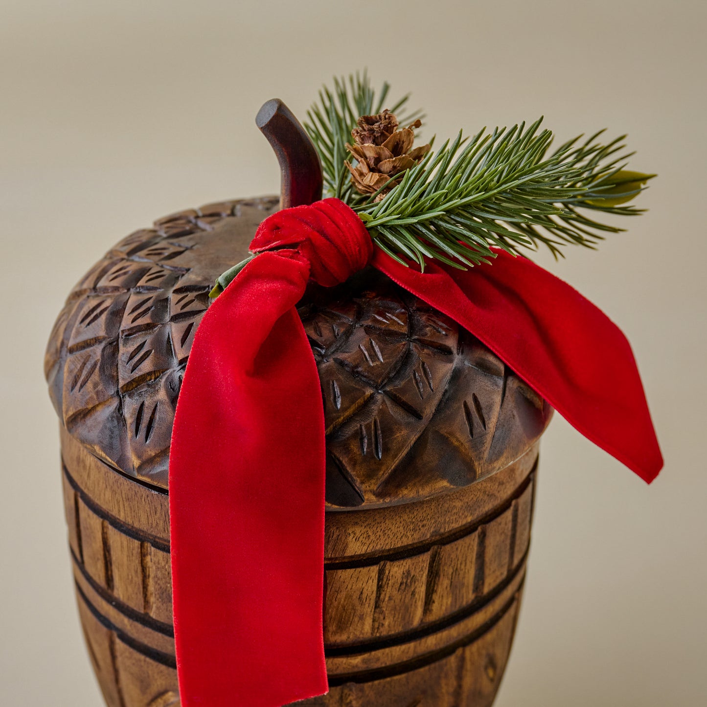 Hand-Carved Frosted Pine Acorn Candle up close