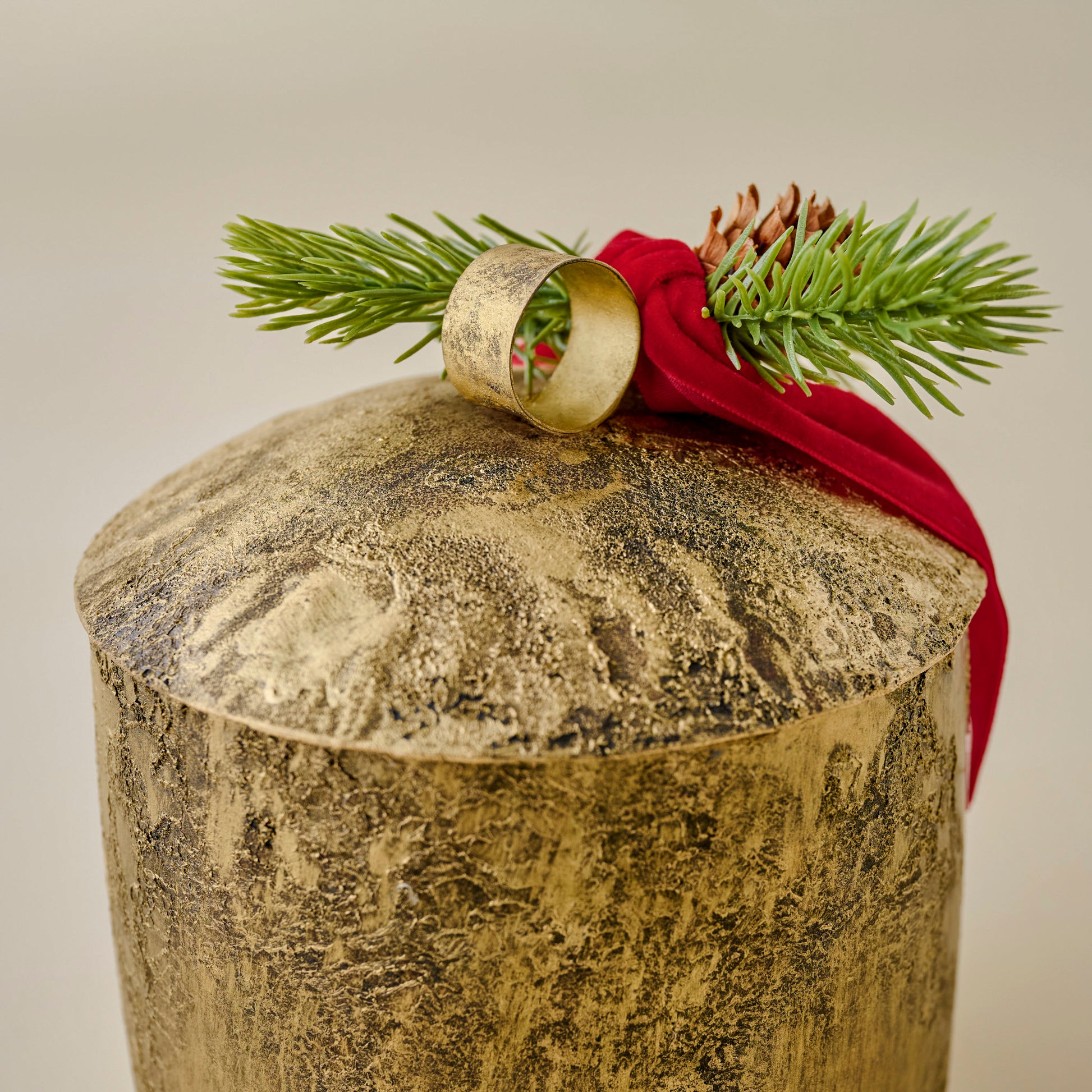Aged Brass Yuletide Spice Bell Candle up close