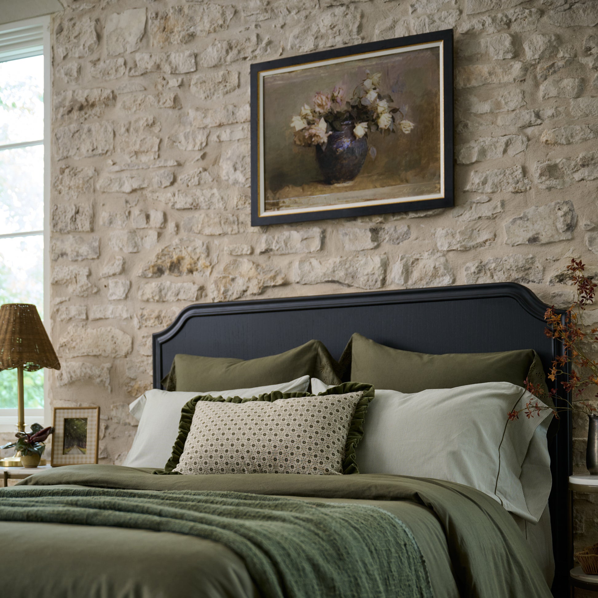 Collected Roses above a bed