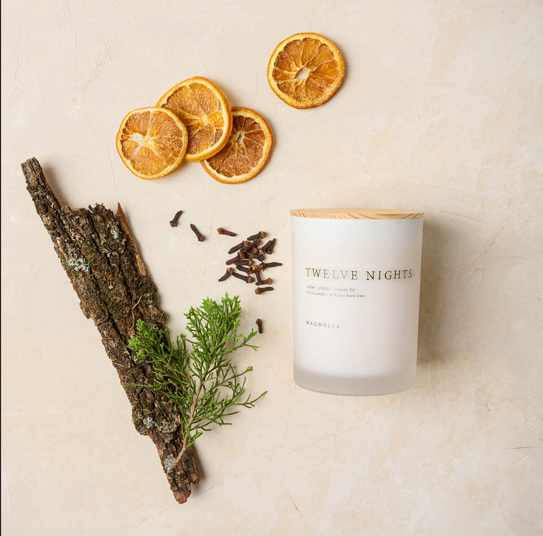 magnolia twelve nights candle scent profile shows cedar citrus and fraser fir