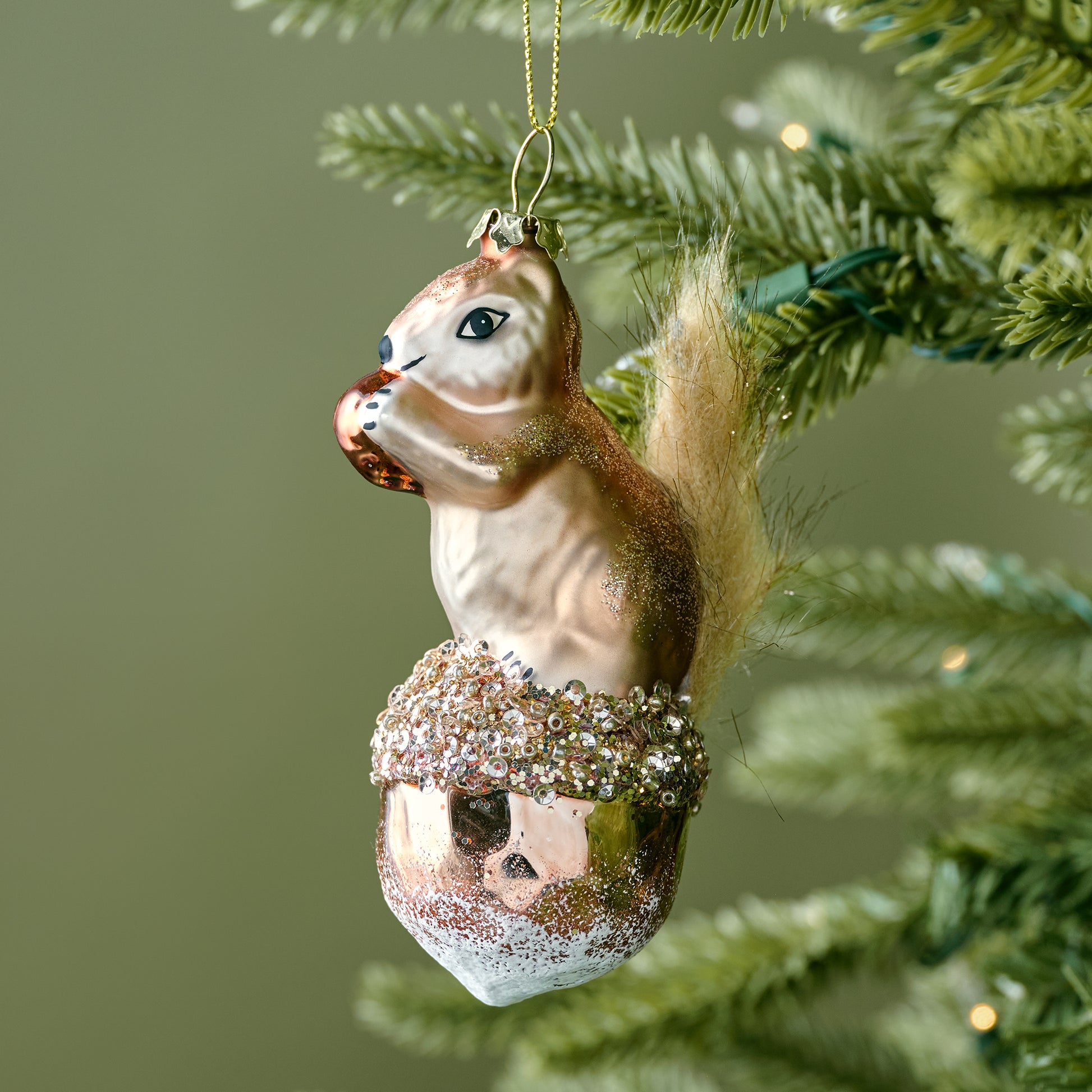 Splendid Squirrel Ornament shown on tree