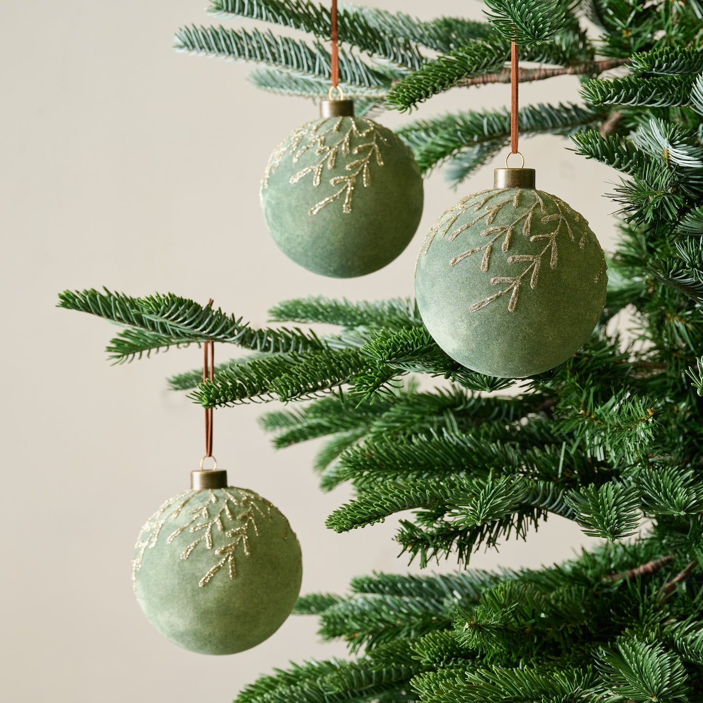 Flocked Floral Glitter Ornament, Set of 3 in Sage Green color shown on tree