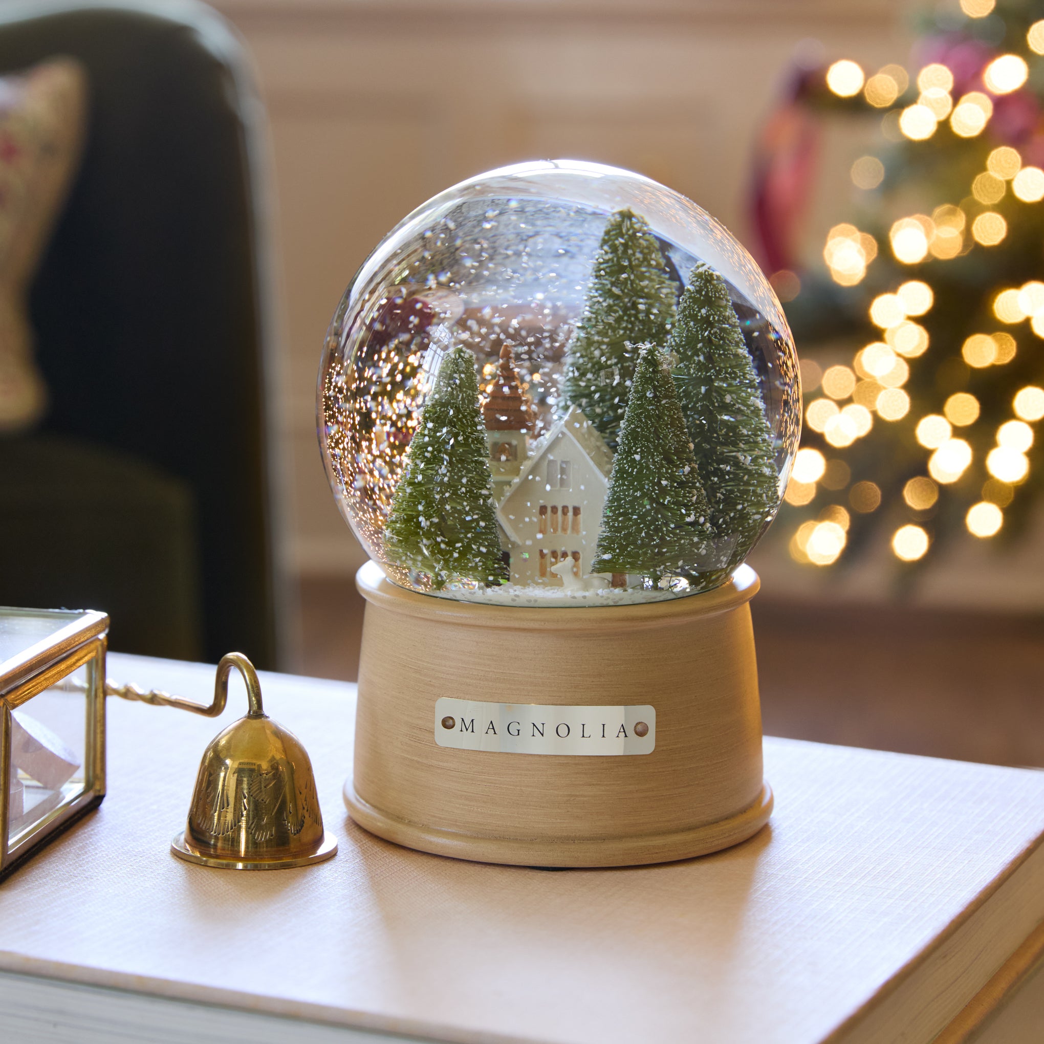 Magnolia Chapel Snow Globe in a room