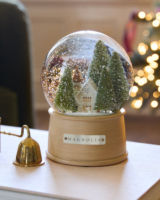 Magnolia Chapel Snow Globe in a room