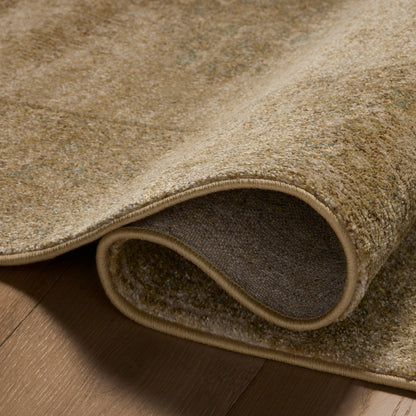 Mona Antique Spa Rug close up of rolled rug