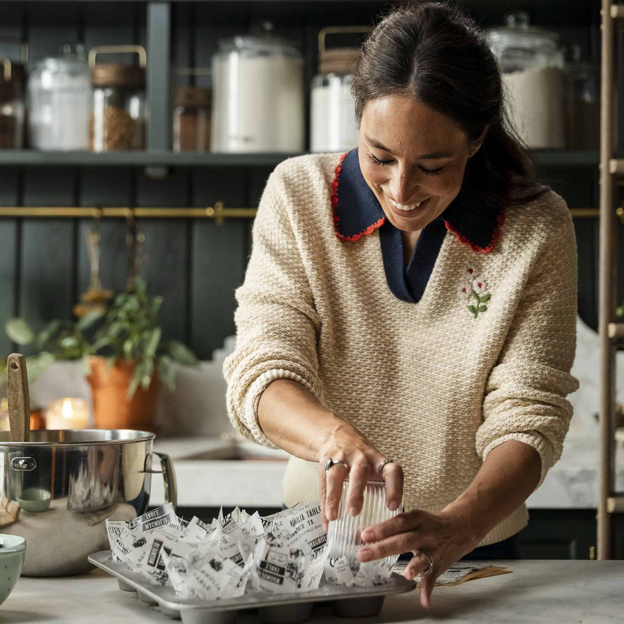 Joanna Gaines in her butler's pantry cooking.