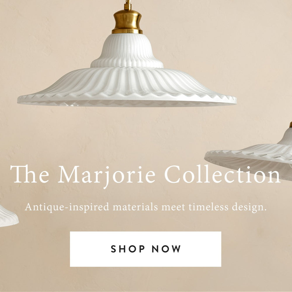 The Marjorie Collection. Antique-inspired materials meet timeless design. Shop now.