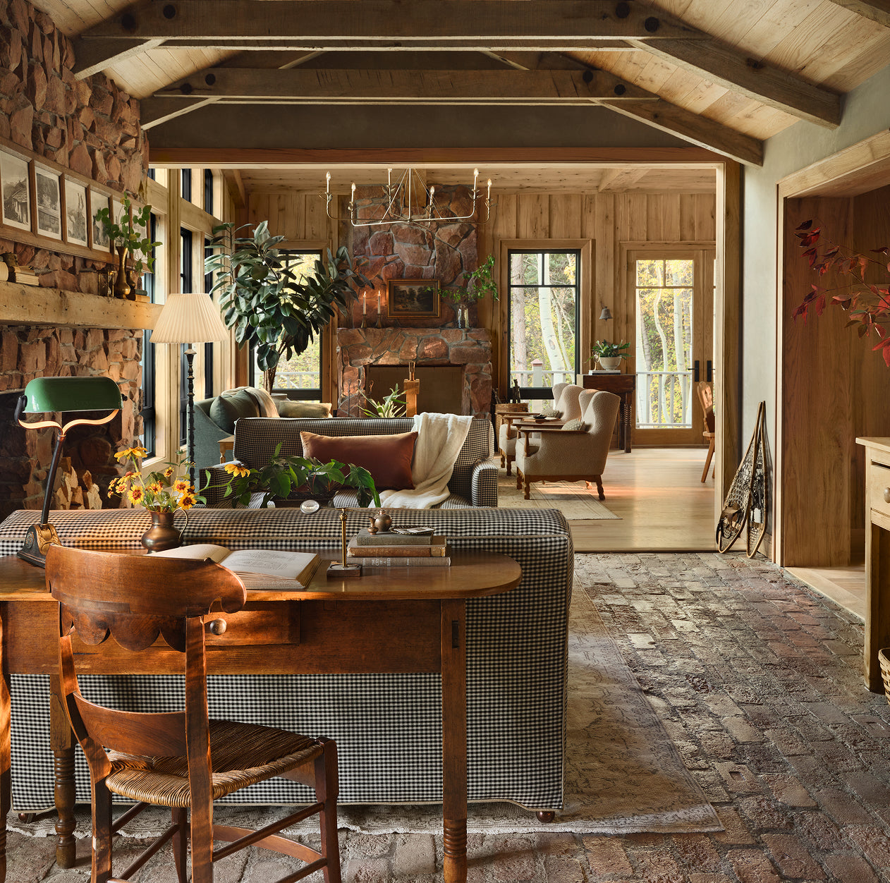 Cozy living room with wooden furniture and a fireplace.