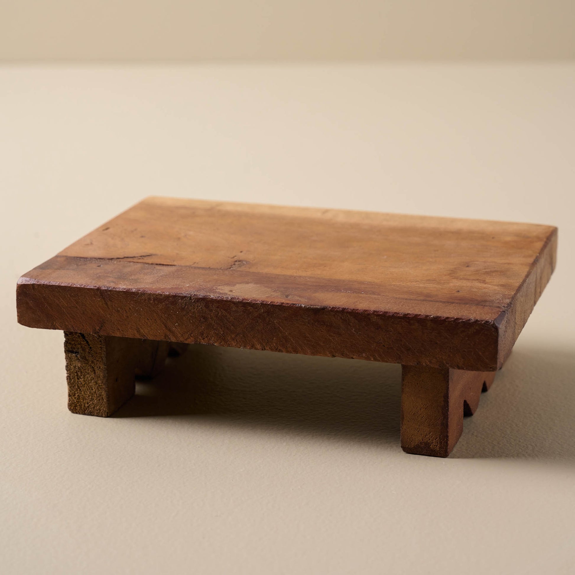 antiqued wooden riser 