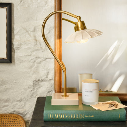 Lulu Enamel Petal Lamp on a book