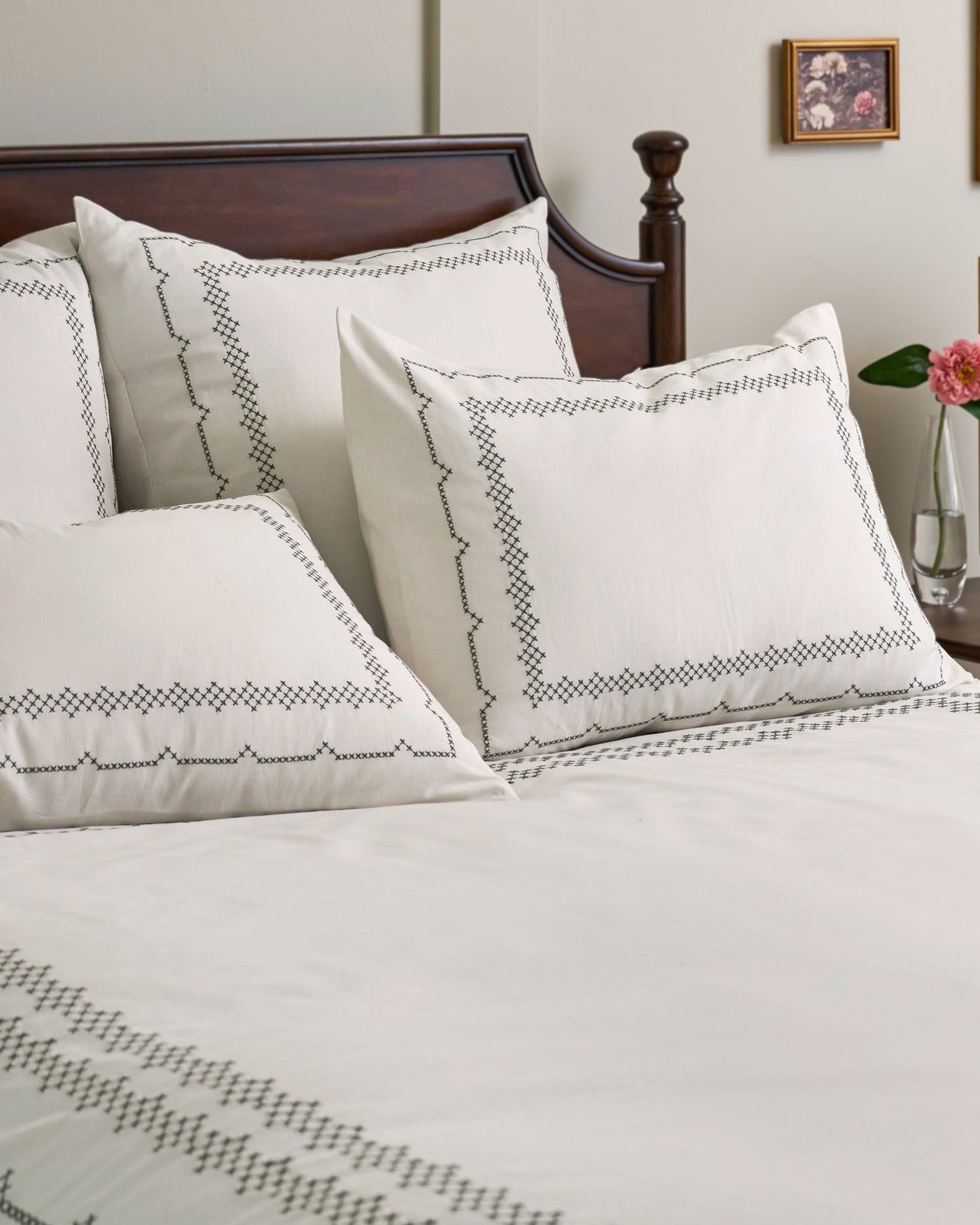 Daphne Cross-Stitch Duvet Cover shown on bed