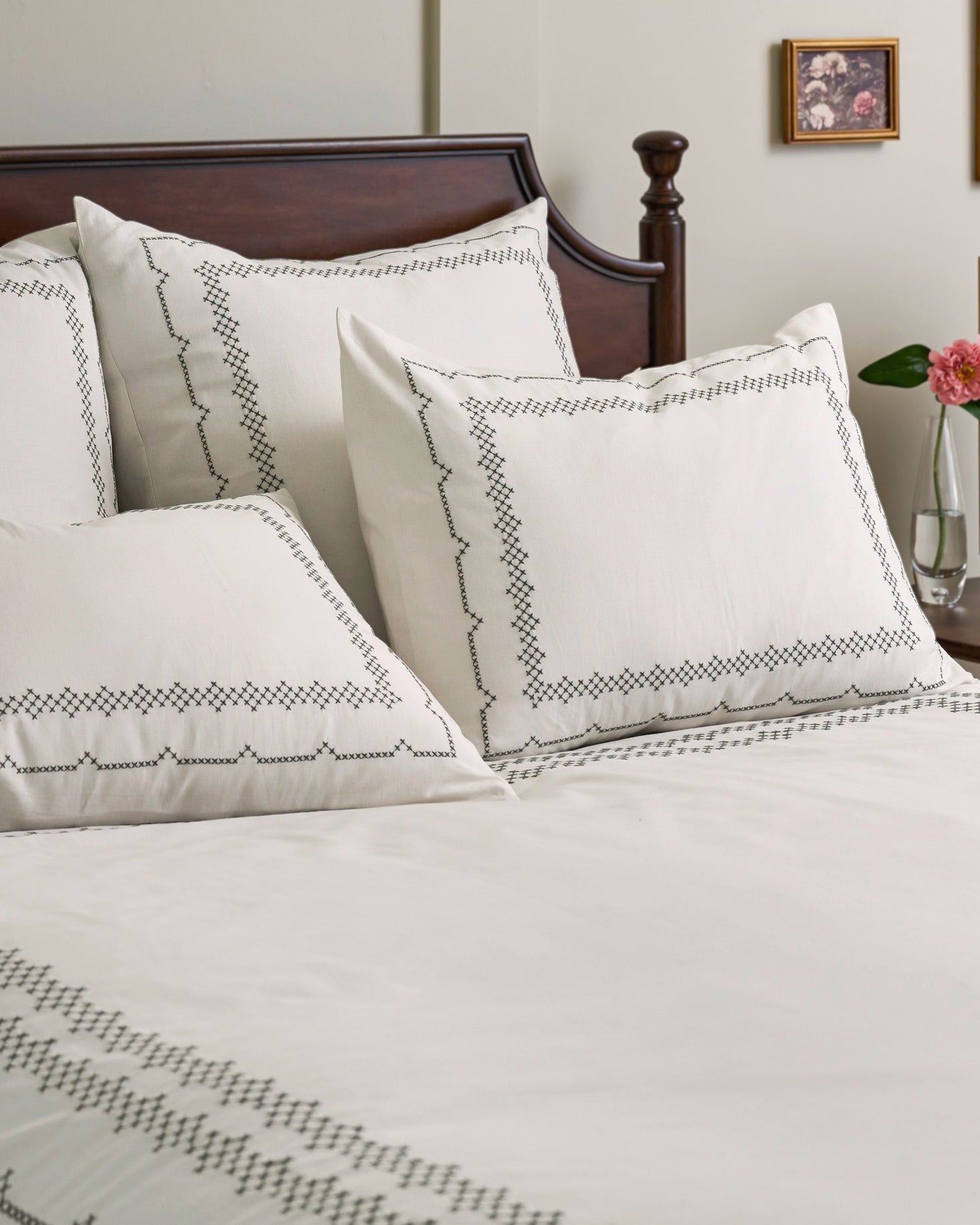 Daphne Cross-Stitch Duvet Cover shown on bed