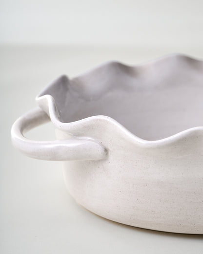 Cream Oval Scalloped Baker close up of scalloped detail and handles
