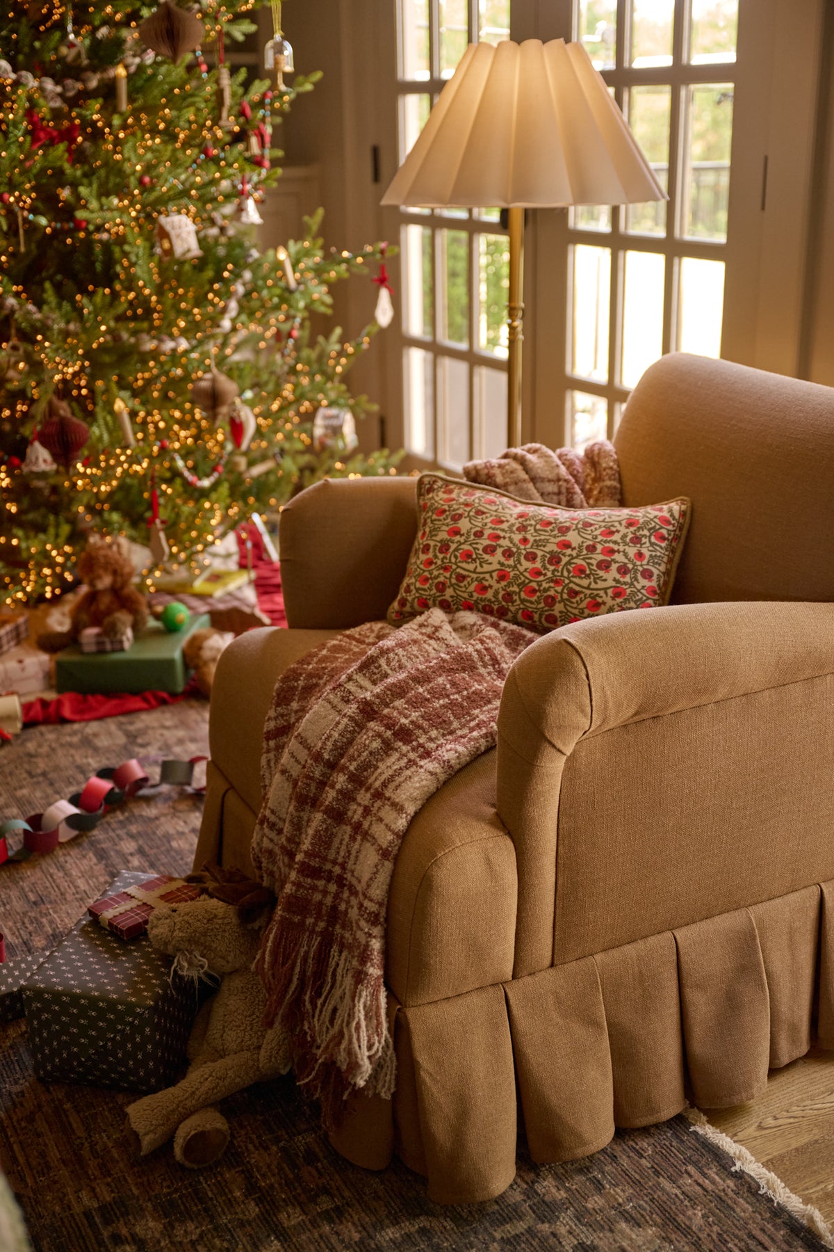 Settle In Plaid Throw in Brown in a room