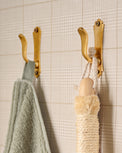 Lillian Solid Brass Wall Hook on bathroom wall 