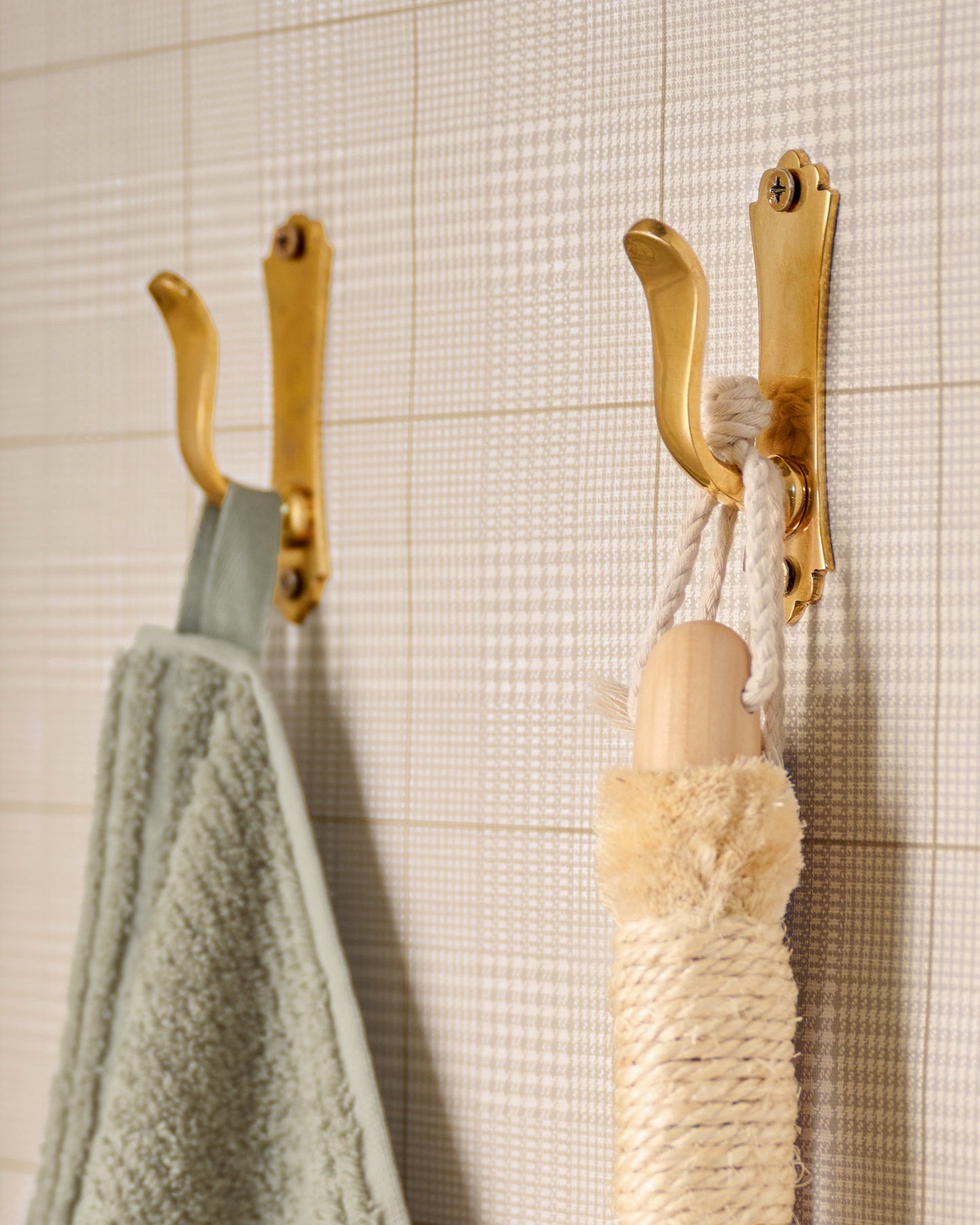 Lillian Solid Brass Wall Hook on bathroom wall 