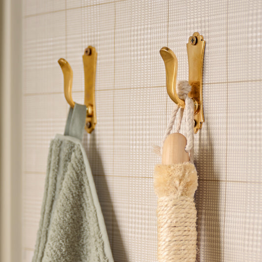 Lillian Solid Brass Wall Hook on bathroom wall 