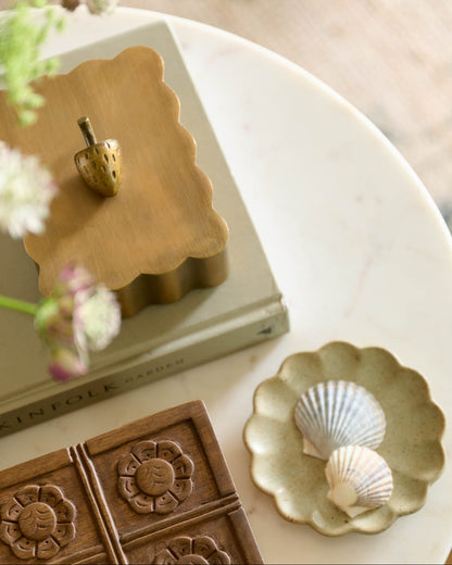 Antiqued Brass Scalloped Box Small on top of book