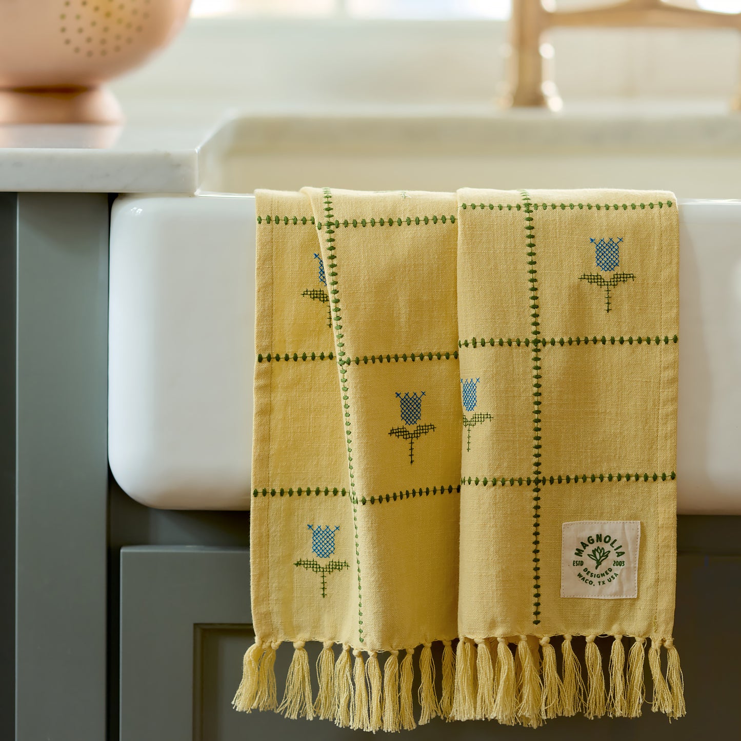 Cross Stitch Tulips Tea Towel laid across kitchen sink