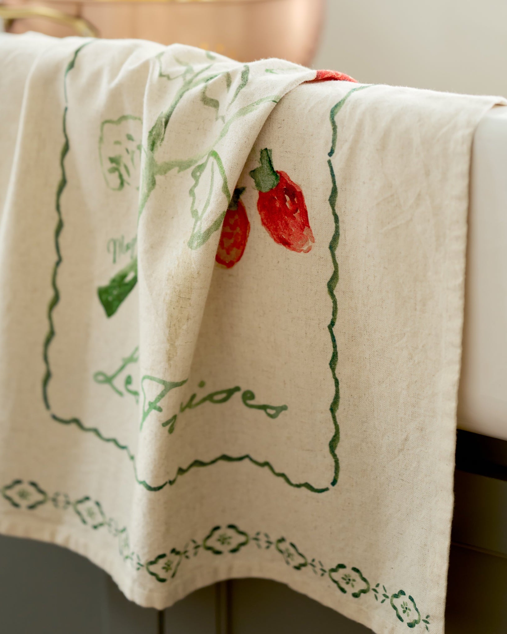 Les Fraises Printed Tea Towel laid on kitchen sink