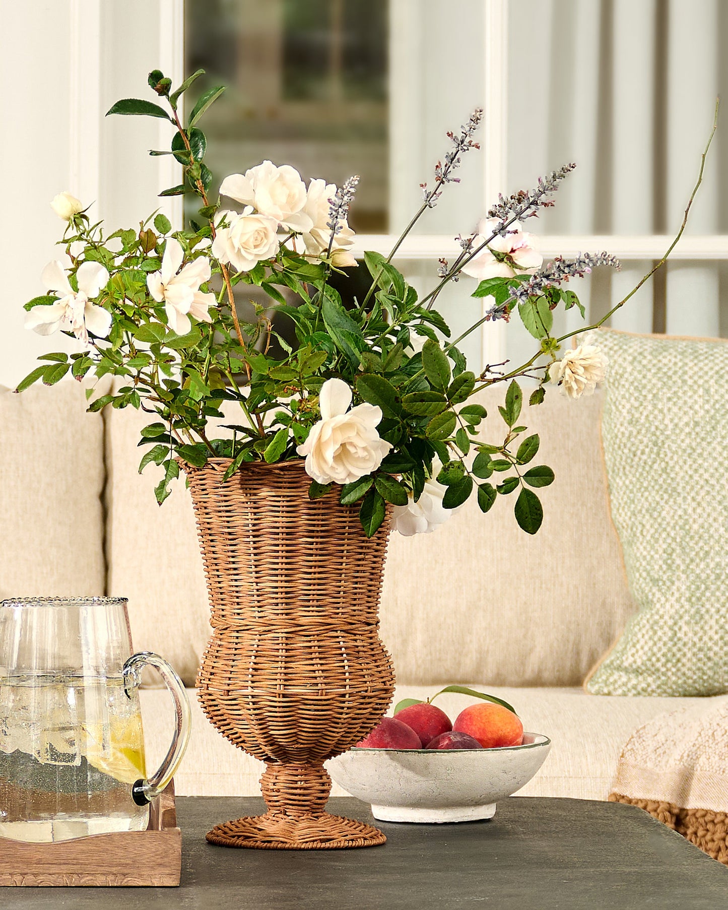 Woven Rattan Footed Vessel with flowers 