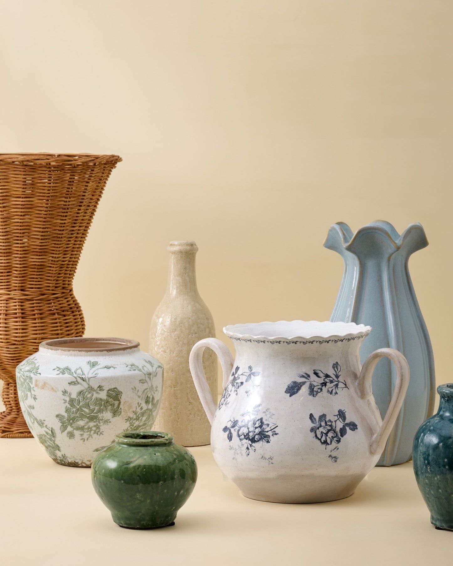 Serena Crackle Glaze Bud Vase shown with other vases