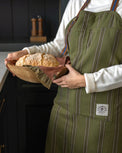 Olive Herringbone Stripe Apron on model