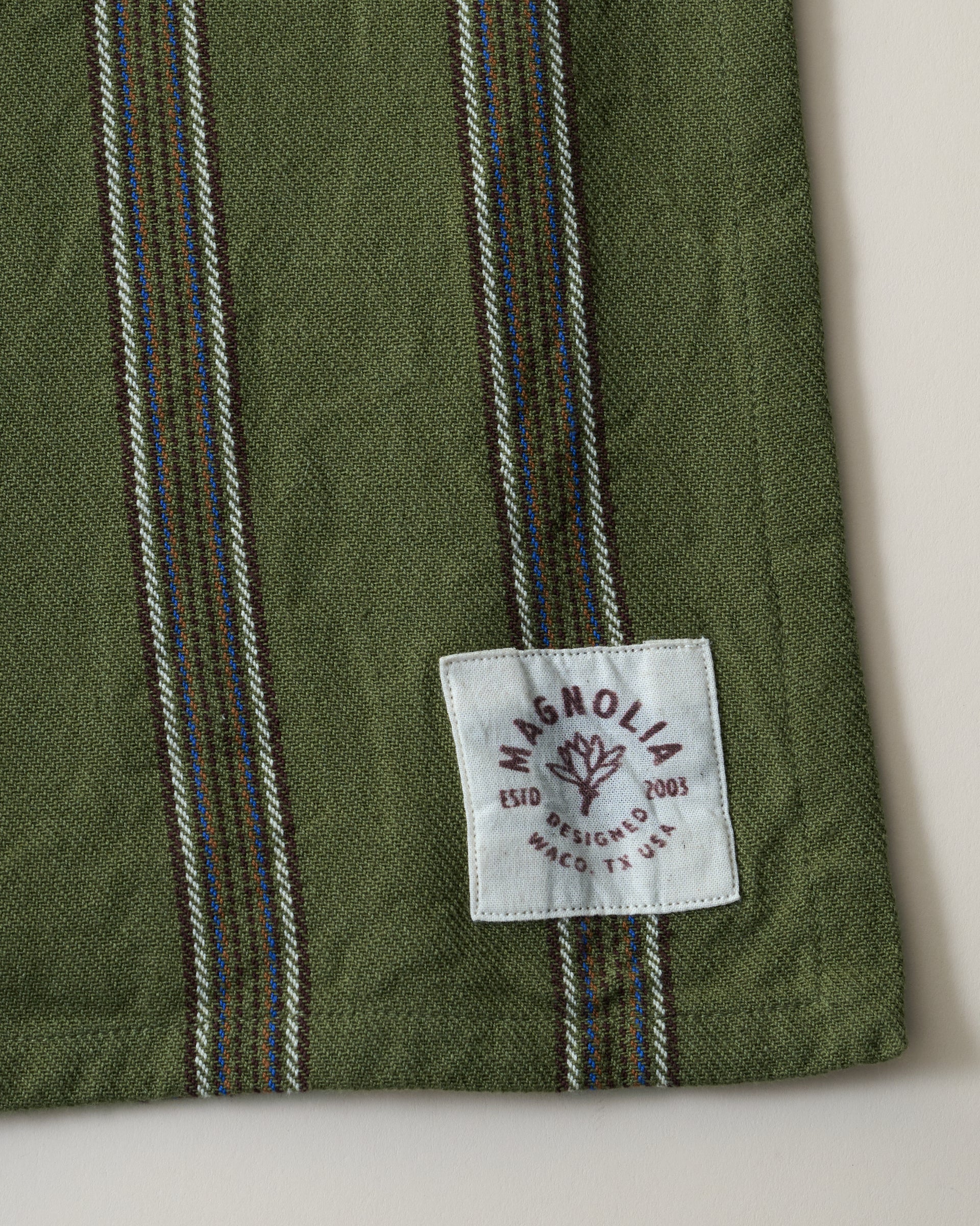 Olive Herringbone Stripe Tea Towel close up logo and stripe pattern