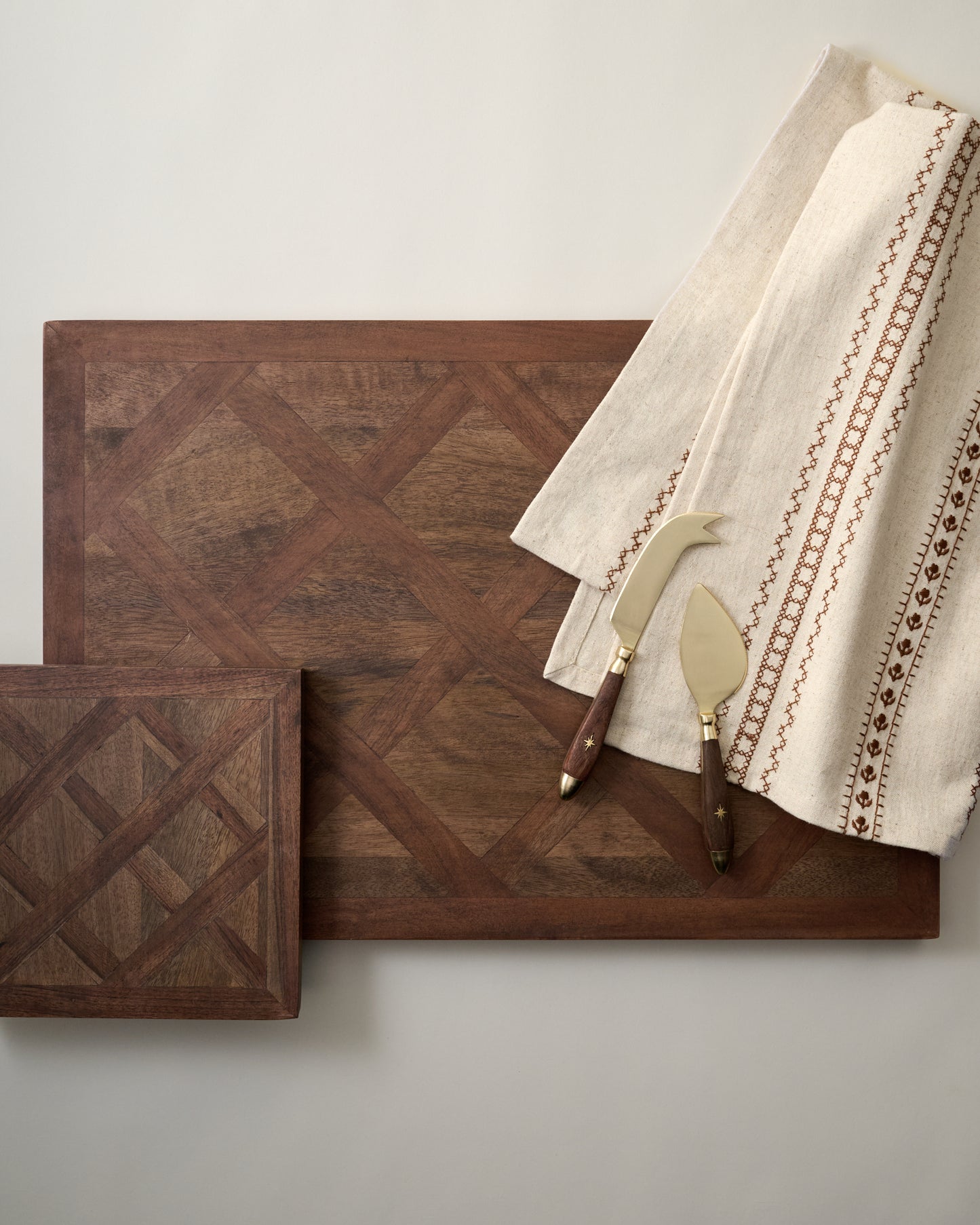 Lattice Two-Tone Serving Board with tea towel and cheese knives