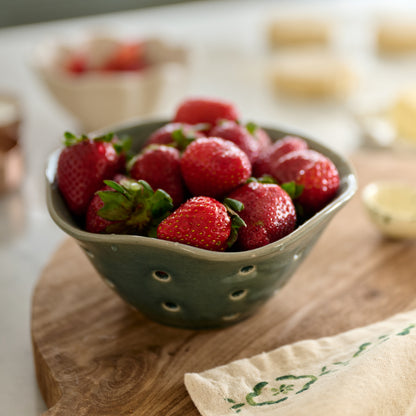 Ceramic Berry Bowl in Green with strawberries in kitchen