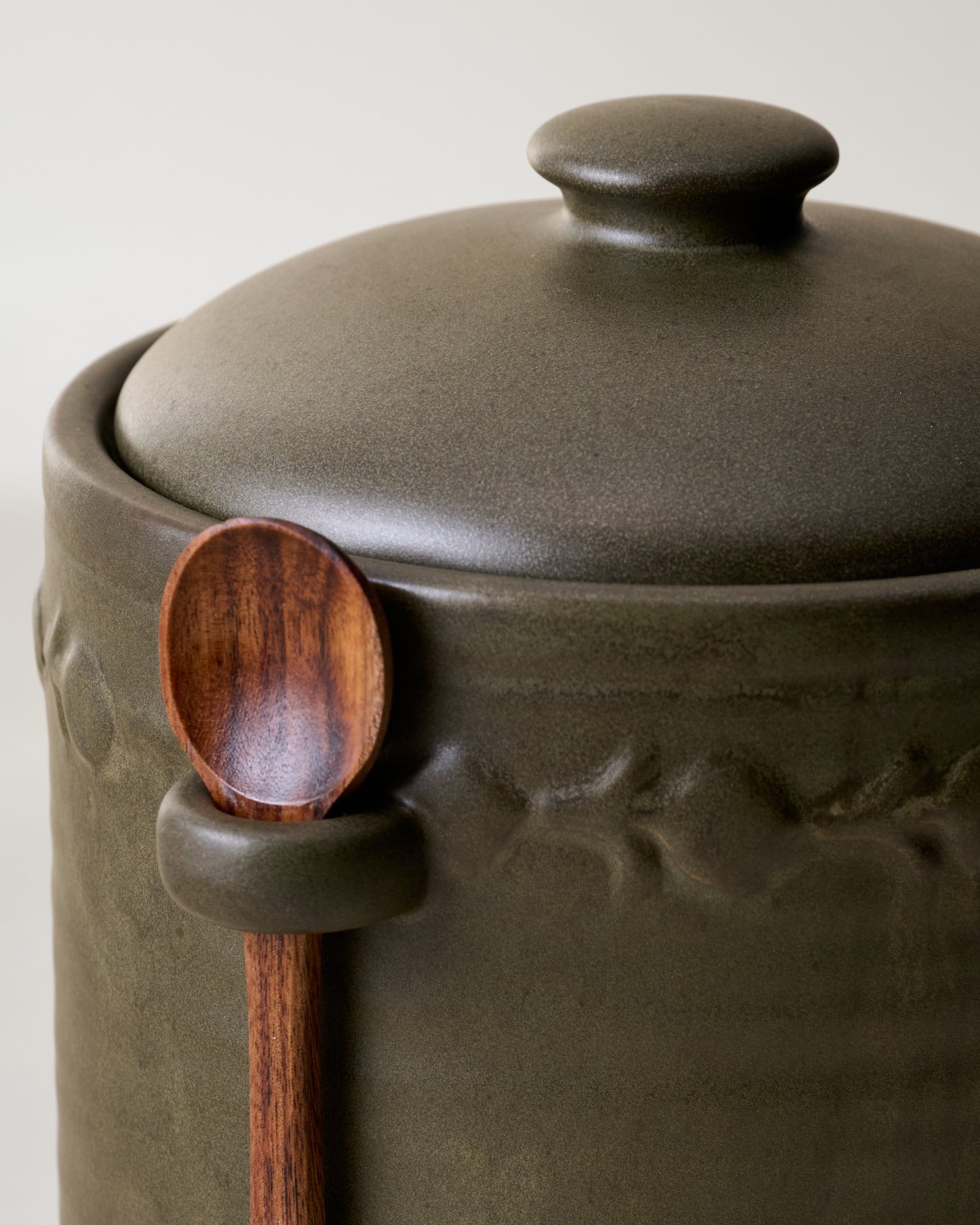 Emilie Dark Olive Canister + Scoop close up